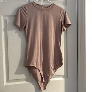 Ninexis bodysuit tee, minimal wear, light pink, size small